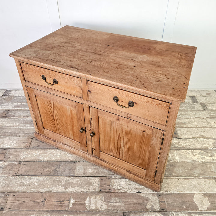 Vintage living room media unit made from pine.