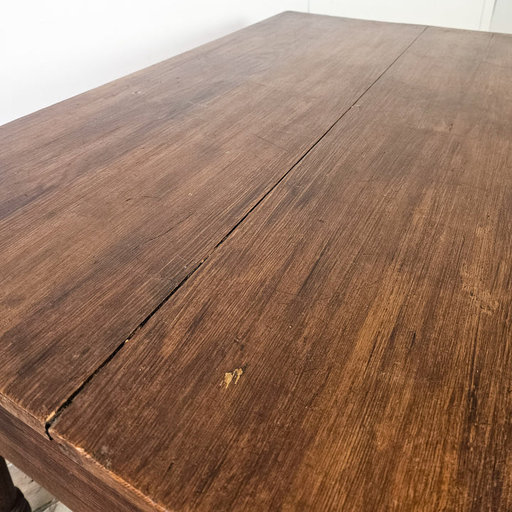 Antique pine table with practical drawer storage, turned legs and solid proportions throughout

