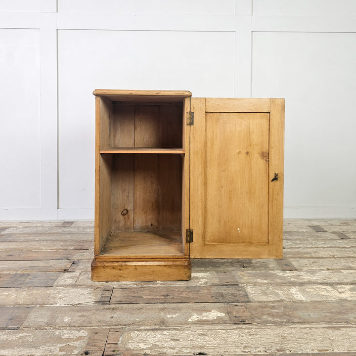 Antique storage cupboard with shelf