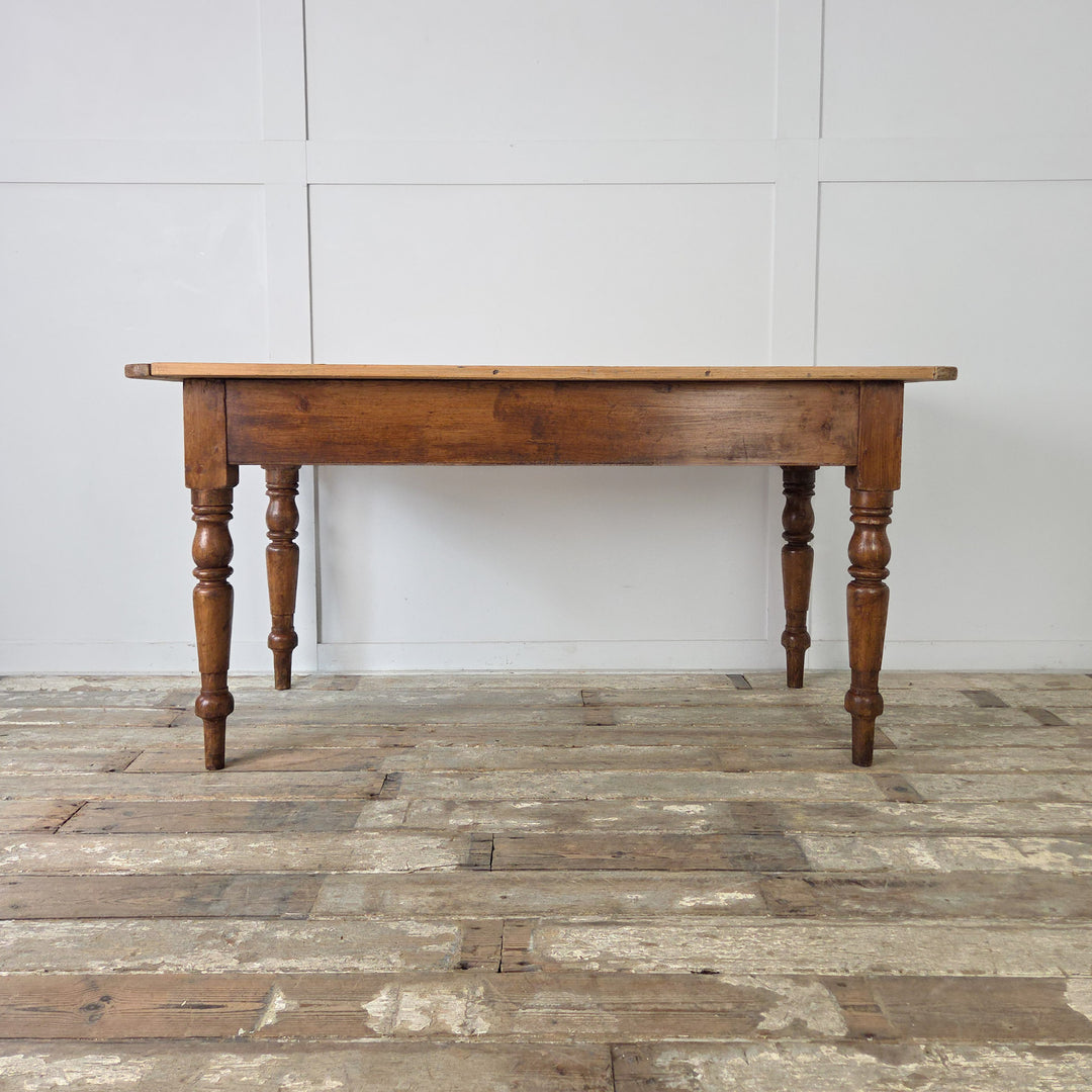 19th century antique pine prep table, English farmhouse furniture with authentic period details, decorative legs, and versatile design.
