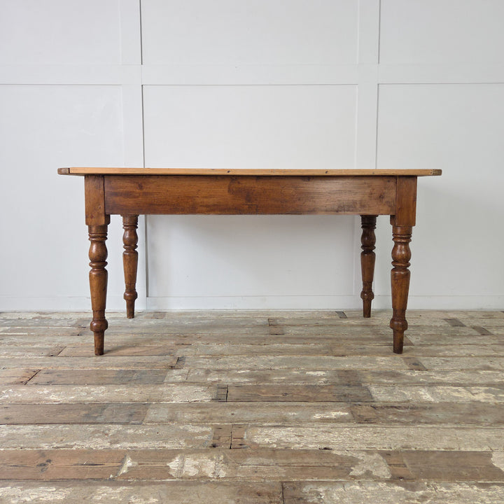 19th century antique pine prep table, English farmhouse furniture with authentic period details, decorative legs, and versatile design.
