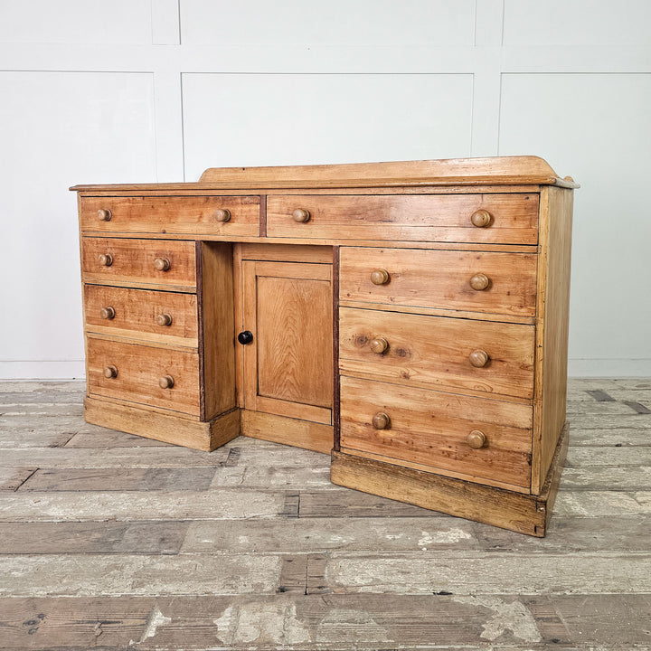 Victorian era pine wood sideboard with ample storage.
