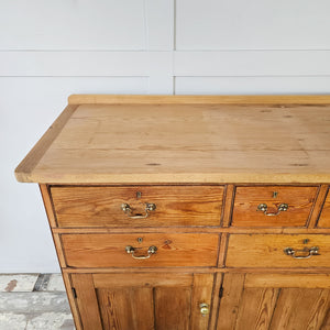 Rustic pine dresser in a simple, classic style.