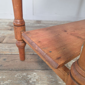 Antique Victorian pine washstand with gallery back, lower shelf and turned legs. A farmhouse style antique console or rustic side table, suitable for hallways, bedrooms or living spaces, combining the practicality of storage with the beauty of waxed 19th century pine