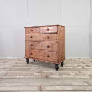 Victorian pine five drawer chest retaining its original buttermilk painted finish and four contrasting bun feet
