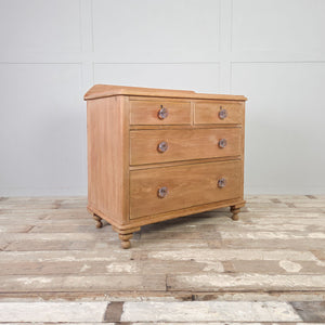 Solid pine cottage style drawers featuring a clear wax finish and a functional rear upstand.
