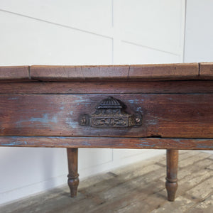 Victorian pine kitchen table with a single apron drawer and four turned and shaped legs
