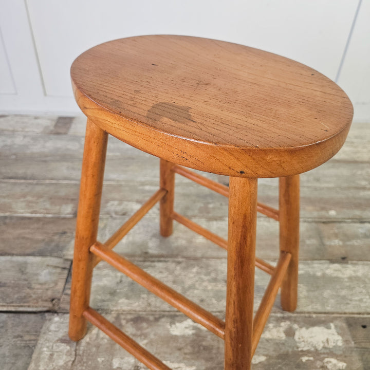 Mid-century elm stool, beautifully patinated, with oval seat.
