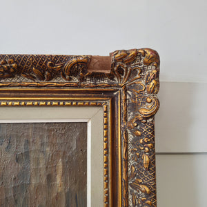 Rustic Belgian still life oil painting, c.1940, highlighted by the artist’s skilled brushwork and harmonious arrangement of pottery, glass, and copper. The decorative wooden frame enhances the traditional feel, making this a versatile piece for the home.