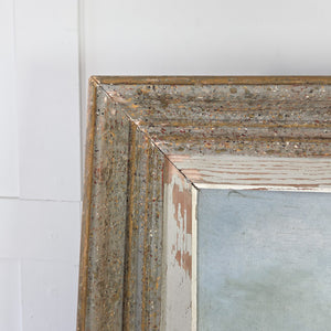 Vintage French oil painting on board dating to the 20th century, showing a calm countryside pond with reflections of surrounding trees and greenery, finished in a weathered painted wooden frame. A decorative original artwork in natural shades of green, blue, and earth tones, ideal for traditional interiors.