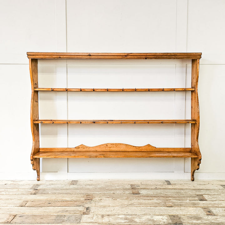 19th-century Victorian pine wall rack with three shelves.