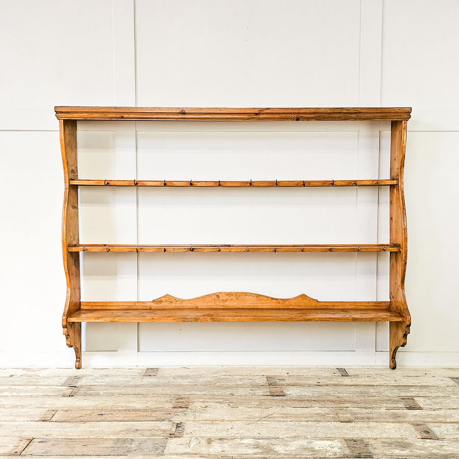 19th-century Victorian pine wall rack with three shelves.