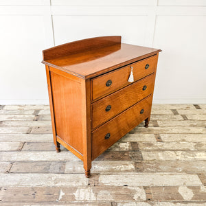 Vintage oak dresser with oval handles and rich patina