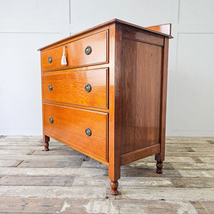 Vintage oak chest with three drawers and oval handles