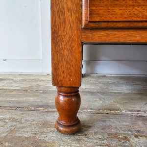Antique oak chest by Waring and Gillow, oval-shaped handles