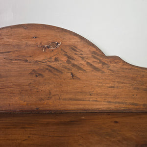 A country house style Victorian pine chest of drawers with a gallery back, sturdy bracket feet and a dark waxed finish. The rustic pine construction and two-over-two layout offer reliable cottage style bedroom storage.