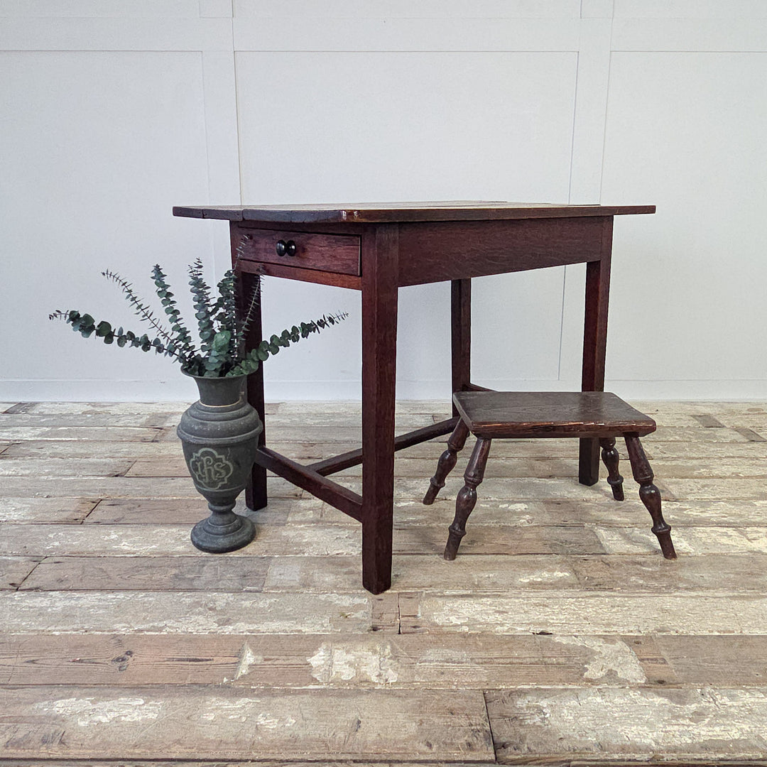  A compact farmhouse style antique table, ideal as a side table, hall table or small kitchen table.
