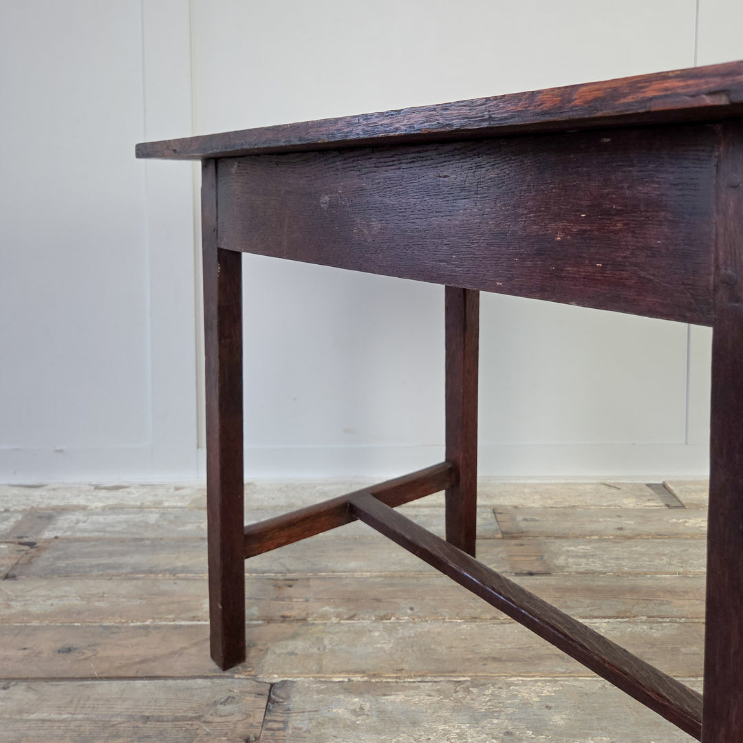 Small farmhouse style antique oak table, 19th century Welsh dairy table with planked top and drawer, supported on straight legs with H-stretcher. Versatile as a hall table, side table or compact kitchen table for rustic farmhouse interiors.