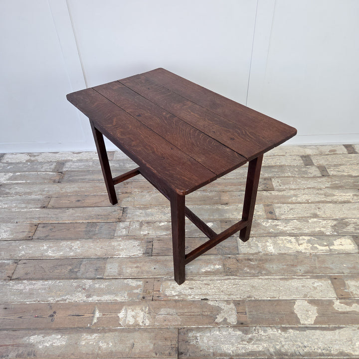 19th century Welsh oak dairy table with four planked rectangular top, single full-length drawer and slim legs joined by a stretcher. Antique farmhouse table in compact proportions, ideal for use as a hall table, side table or kitchen table.
