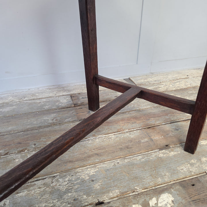 Antique 19th century oak farmhouse table of Welsh origin, rectangular planked top, full-length drawer with original knob, slim legs and stretcher. A modest dairy table suitable for use as a hall table, side table or compact kitchen table.