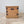 19th century French pine chest with hand-painted garland decoration, iron corner banding and original interior paper lining

