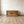 Antique French pine storage chest with hand-painted floral garland and ribbon bow detail to the front and lid
