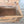 19th century painted pine trunk with original folk art decoration, iron corner banding and swing handles on each side
