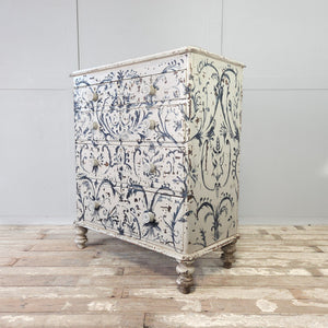 Antique painted pine dresser with Florentine-style blue and white foliate design and mother of pearl inlay knobs
