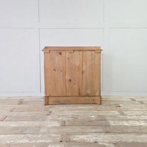 Country style pine four drawer chest with two short over two long drawers and brass swan neck handles