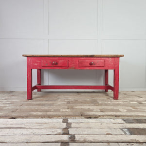 Antique pine farmhouse table with red-painted base and scrubbed pine top
