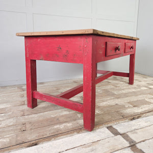 Painted pine farmhouse table with red base, two drawers and H-stretcher legs
