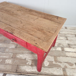 Antique pine kitchen island with red-painted base and two drawers
