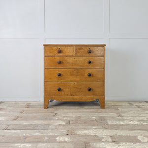 Antique painted pine five drawer chest with shaped bracket feet and curved apron
