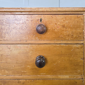 Georgian pine chest of drawers with two short drawers over three long graduating drawers
