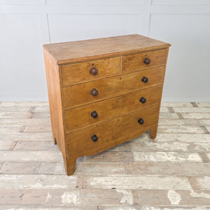 Georgian five drawer pine chest with original painted finish and decorative bracket feet
