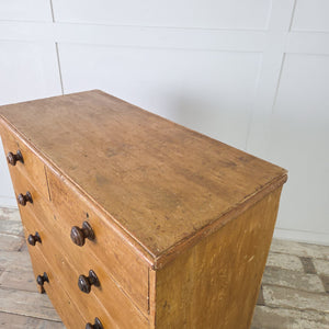 Antique painted pine bedroom drawers with decorative bracket feet and curved apron
