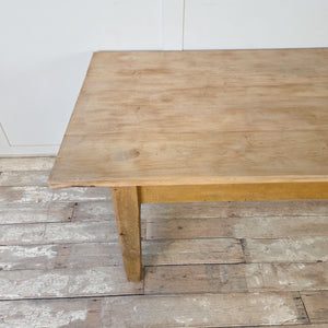 Antique prep table with scrubbed top and painted pine base in warm ochre tone
