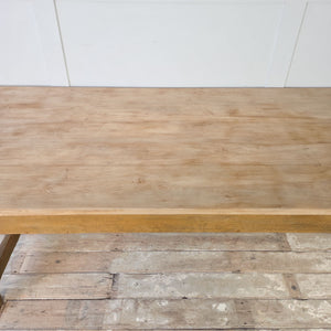 Large Victorian dining table with chunky square legs and low H-shaped stretcher
