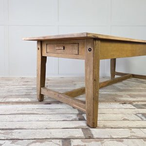 Large antique table with scrubbed poplar top and chunky painted pine legs
