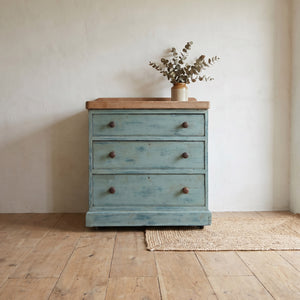 Painted pine antique chest of drawers with three graduating drawers and a chunky stripped top dating from the early 20th century