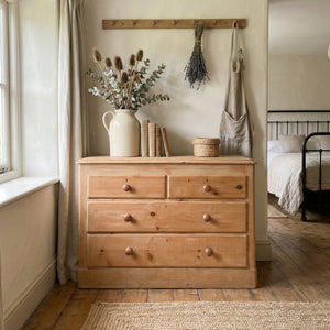 19th century antique Victorian pine chest of drawers with graduated drawers and plinth base.

