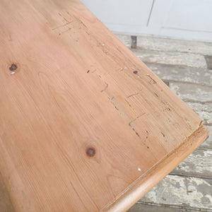 Victorian antique pine storage chest with four drawers, matching wooden knobs and raised on a solid plinth base.



