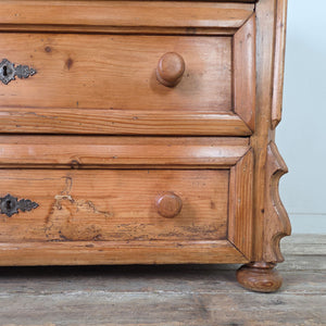 Vintage antique pine three drawer chest of drawers, early 20th century continental piece with carved detailing and metal escutcheons.