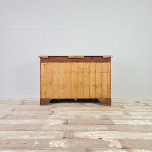 Victorian pine four drawer storage chest with graduated drawer fronts and wooden knobs.
