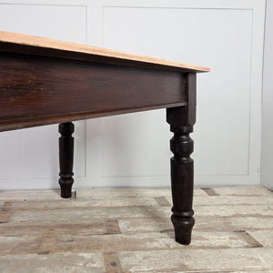 19th Century Victorian farmhouse kitchen table with sycamore plank top and dark painted pine base on turned legs.
