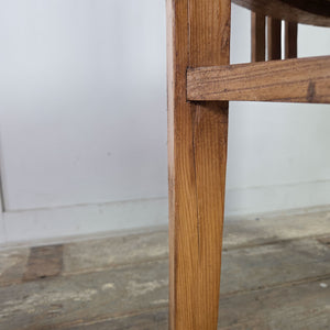 Matching vintage pine tub chairs with classic barrel-back shape, early 20th century, featuring vertical slatted back and sides, continuous curved top rail and square-set legs.
