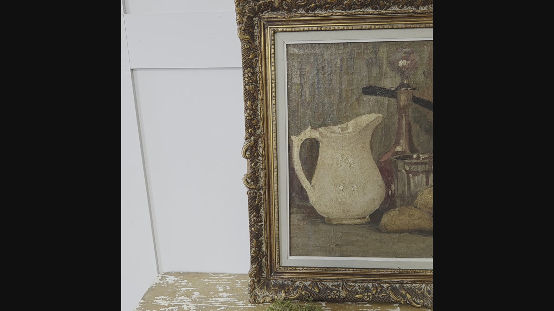 Signed still life oil painting from Belgium, dating to around 1940, with a classic subject of domestic objects arranged on a table. The copper pan stands out for its vibrant orange tones, complementing the muted palette and overall composition.
