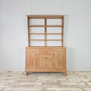 Victorian pine sideboard dresser with open shelving above and generous cupboard storage below
