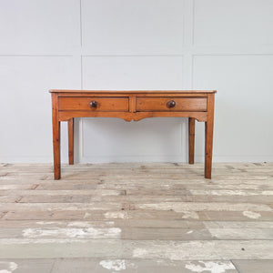 Rustic 19th century pine farmhouse prep table with shaped apron and square tapered legs
