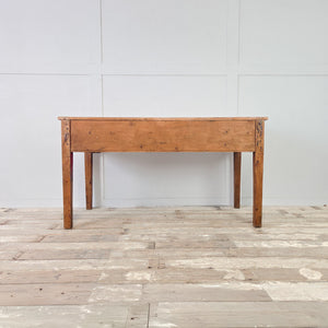 Victorian rustic pine prep table with matching turned drawer knobs and a decorative shaped apron